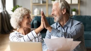 Modoc Gold IRA Investing Company a happy senior couple 300x169